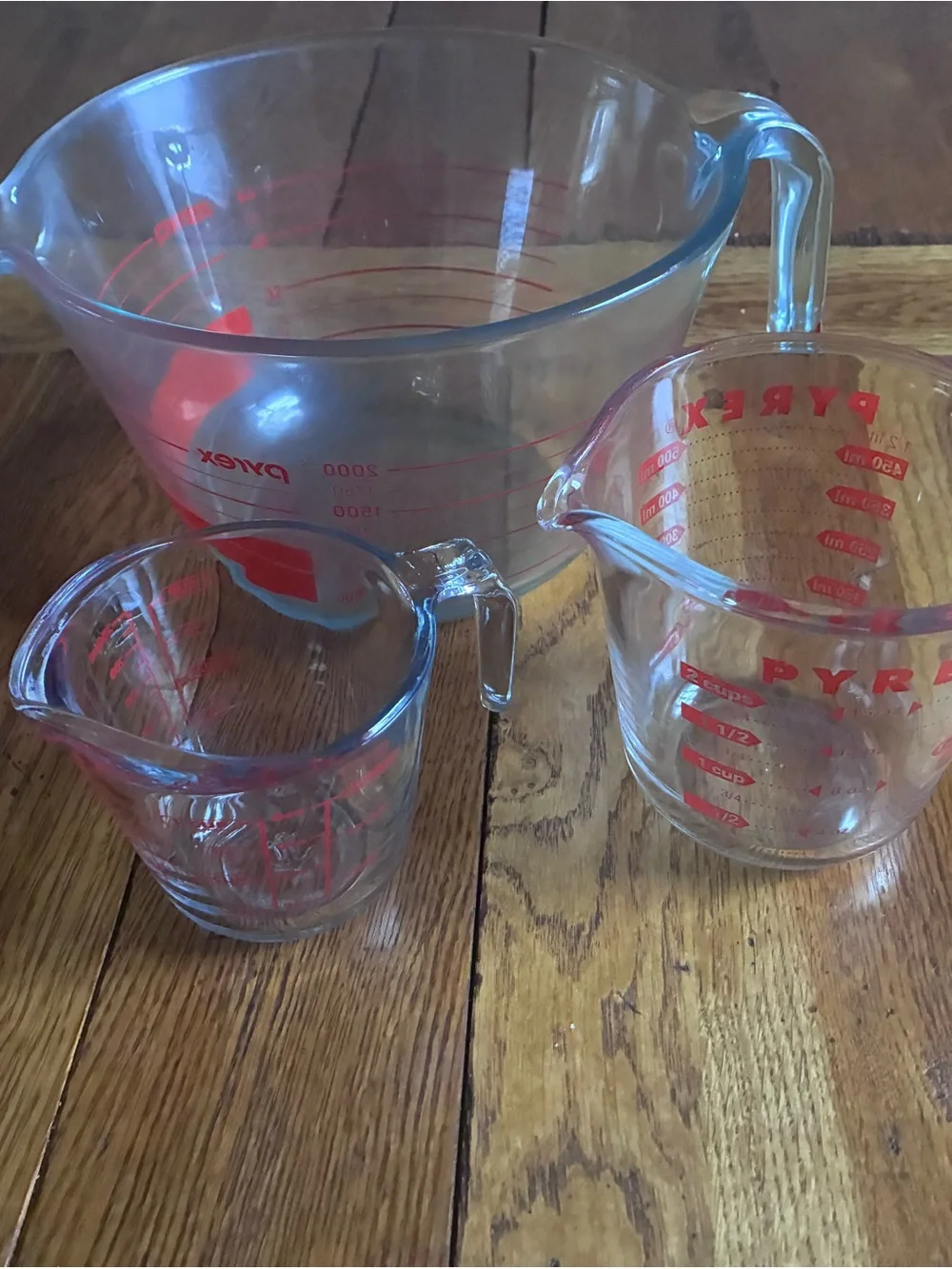Glass Measuring Cup Set:  Pyrex 8 cups,  Pyrex 2 cups and 1 cup Anchor hocking